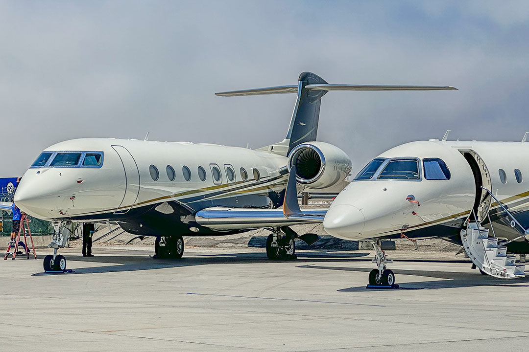 Two private jets parked together